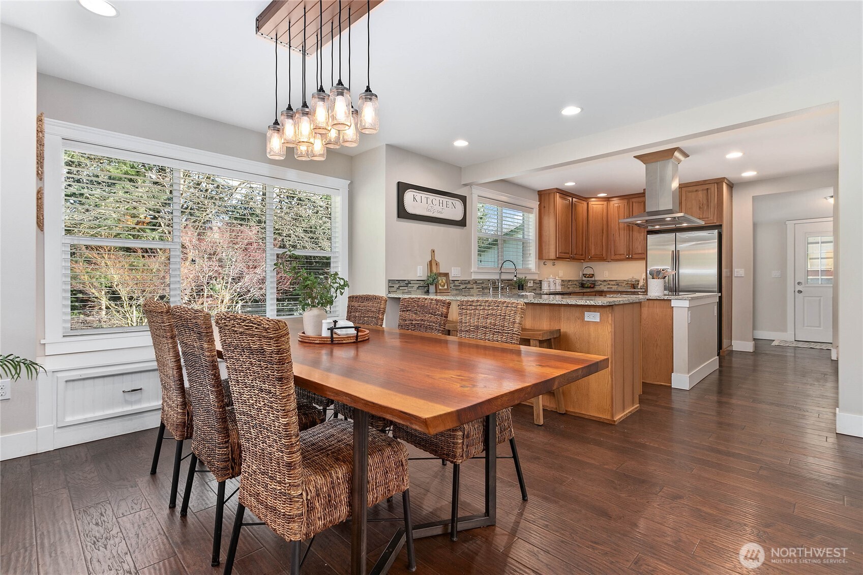 3269 Haynie Road Custer, WA 98240 - Photo 6 of 39 a dining room with stainless steel appliances granite countertop a table chairs and a chandelier