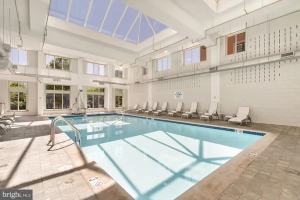 a view of a kitchen with a sink and cabinets