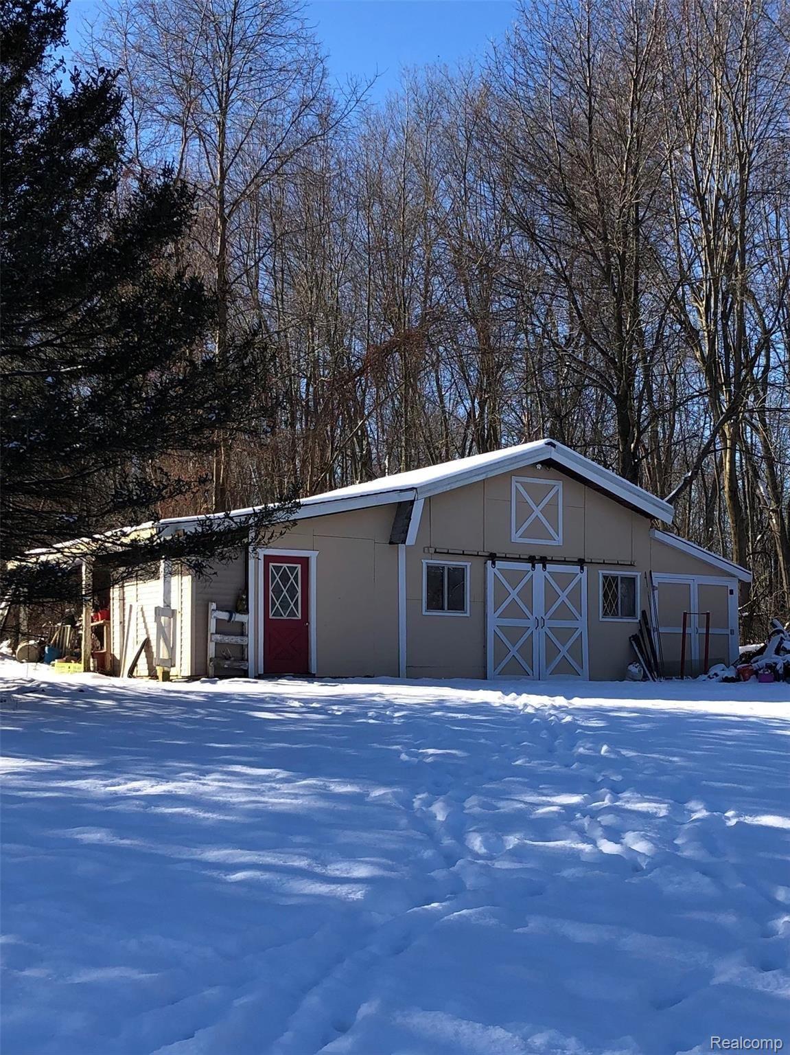 5208 Casey Road Dryden, MI 48428 - Photo 44 of 52 24' x 30' hip roof barn with dirt floor