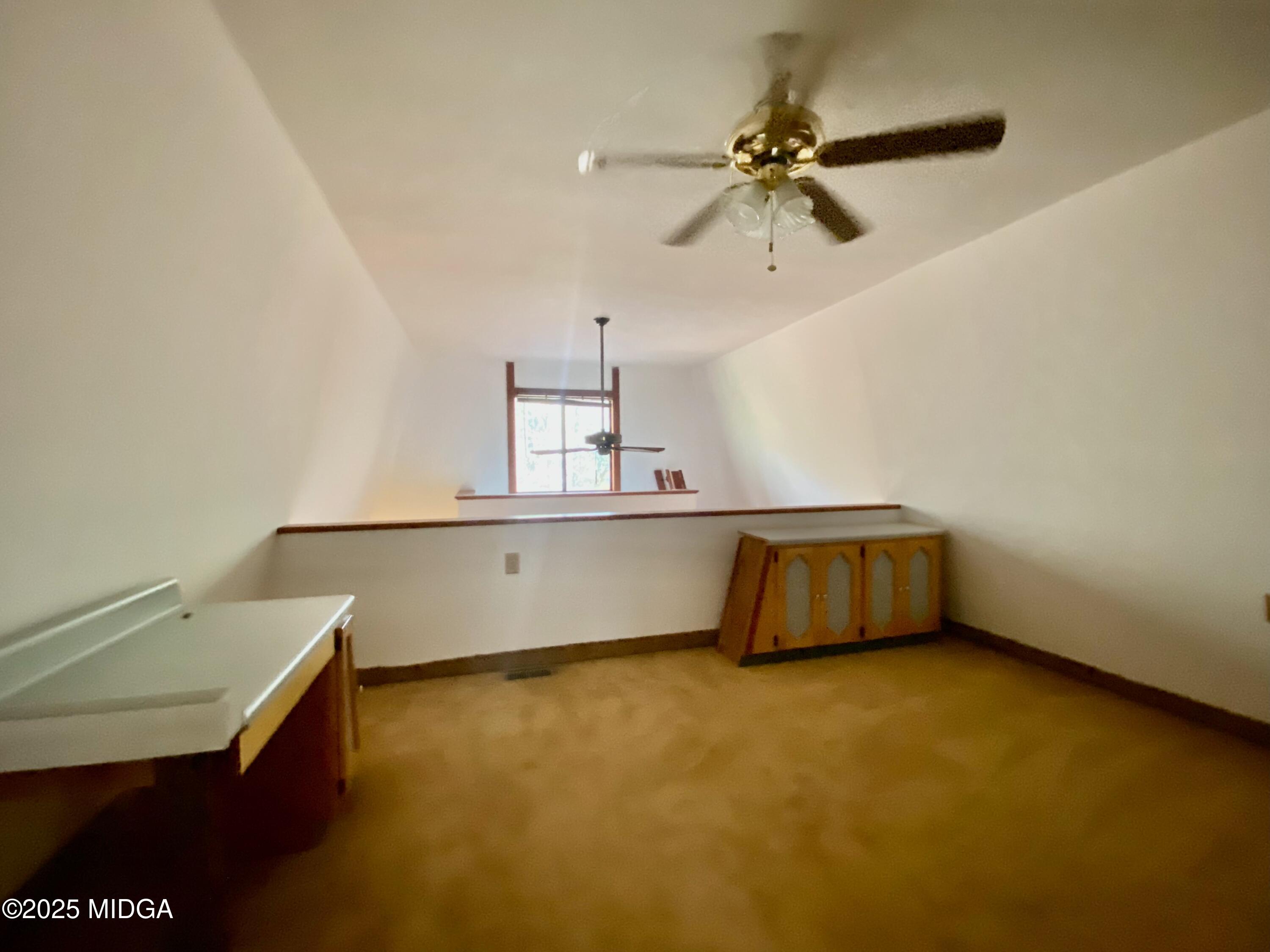 231 West Seminole Drive Byron, GA 31008 - Photo 11 of 38 a view of an empty room with a window