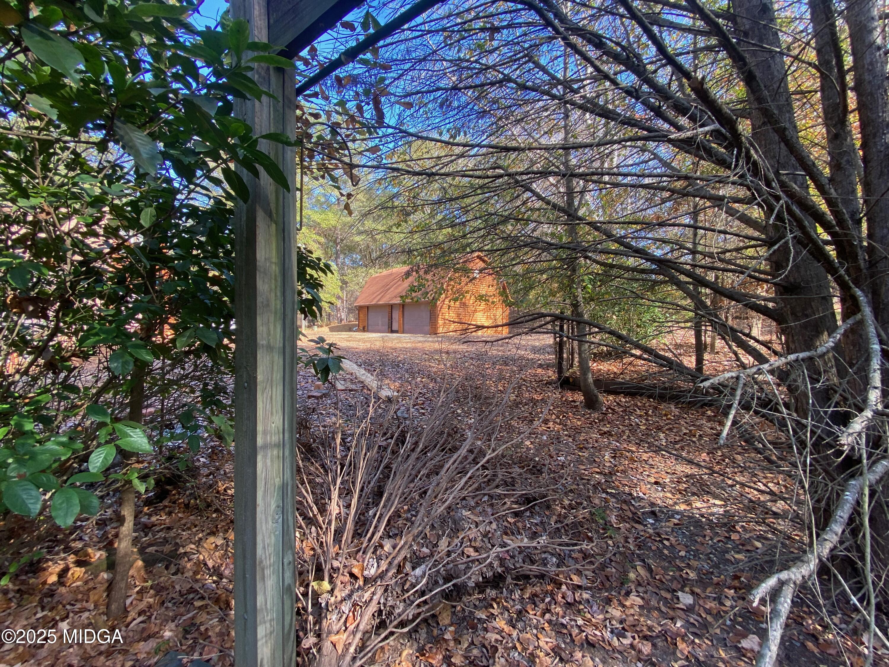 231 West Seminole Drive Byron, GA 31008 - Photo 33 of 38 a view of a yard with a tree
