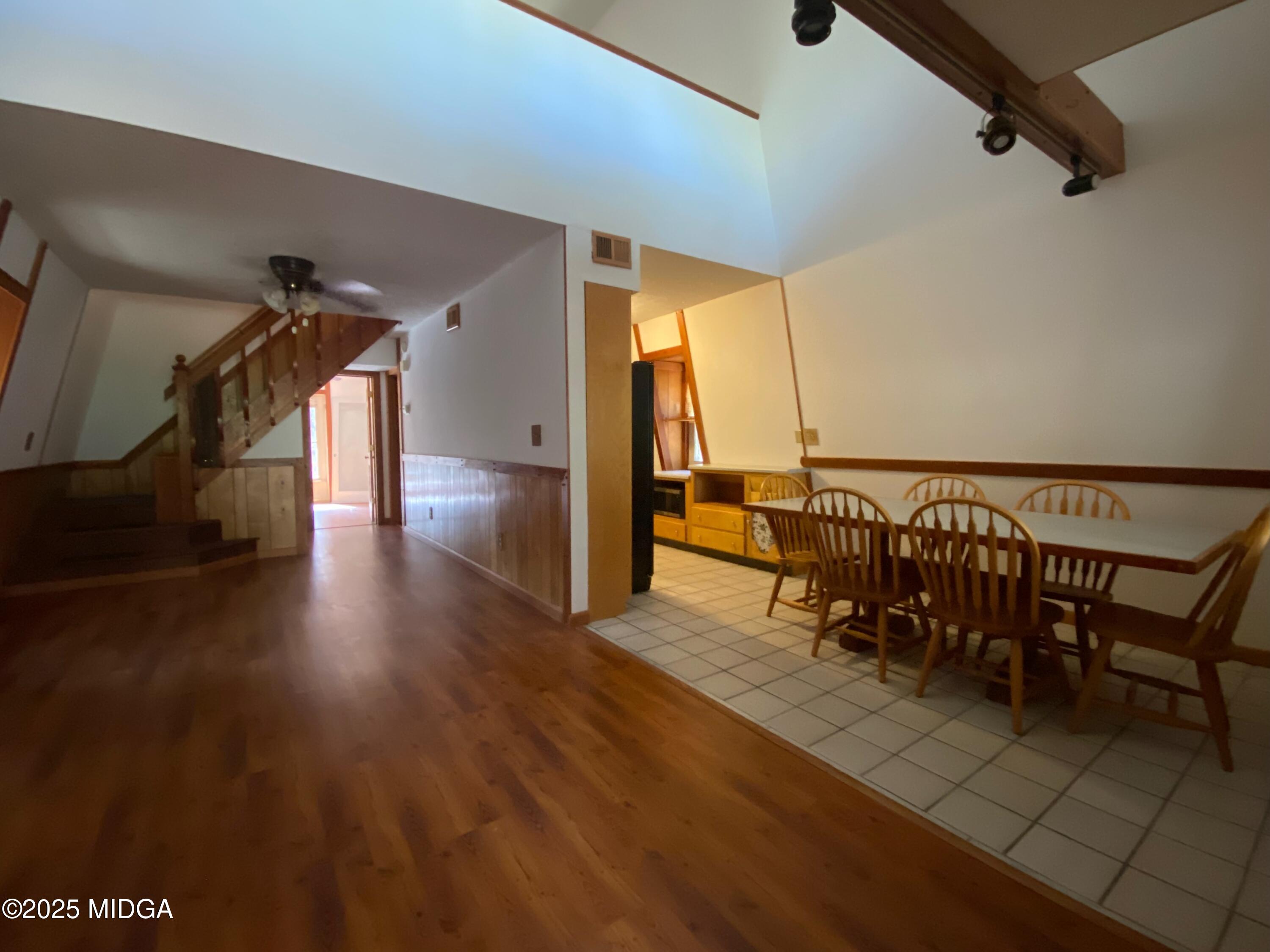 231 West Seminole Drive Byron, GA 31008 - Photo 4 of 38 a view of dining room with furniture and wooden floor