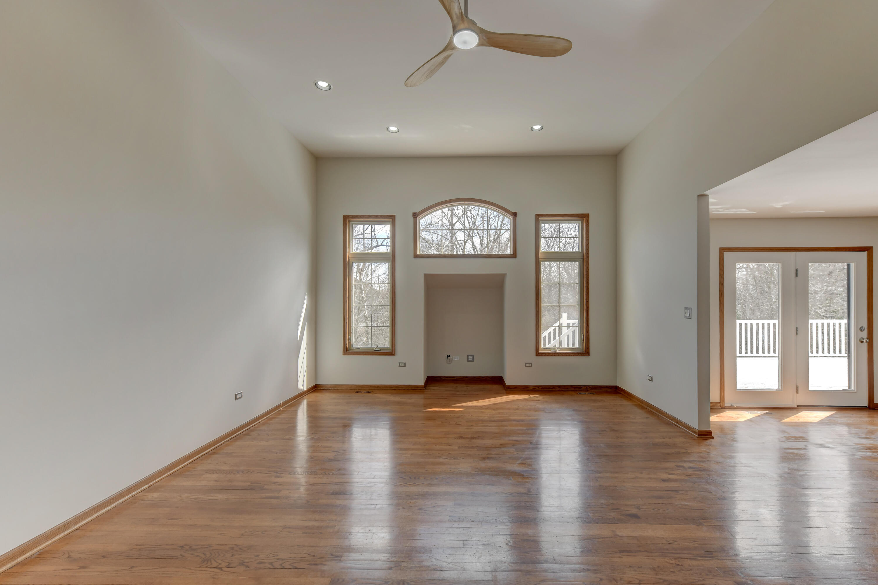 9575 Calumet Street Dyer, IN 46311 - Photo 22 of 53 an empty room with wooden floor cabinet and windows