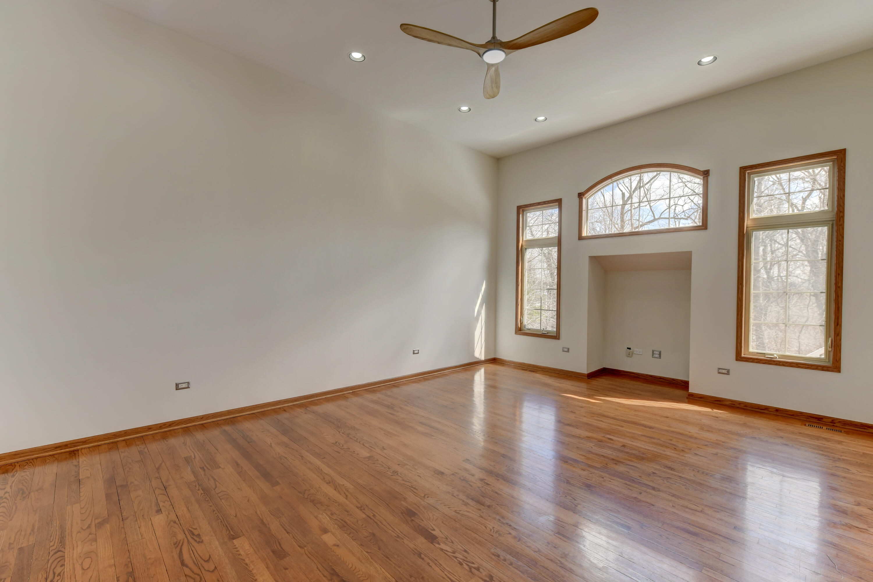 9575 Calumet Street Dyer, IN 46311 - Photo 26 of 53 an empty room with wooden floor and windows