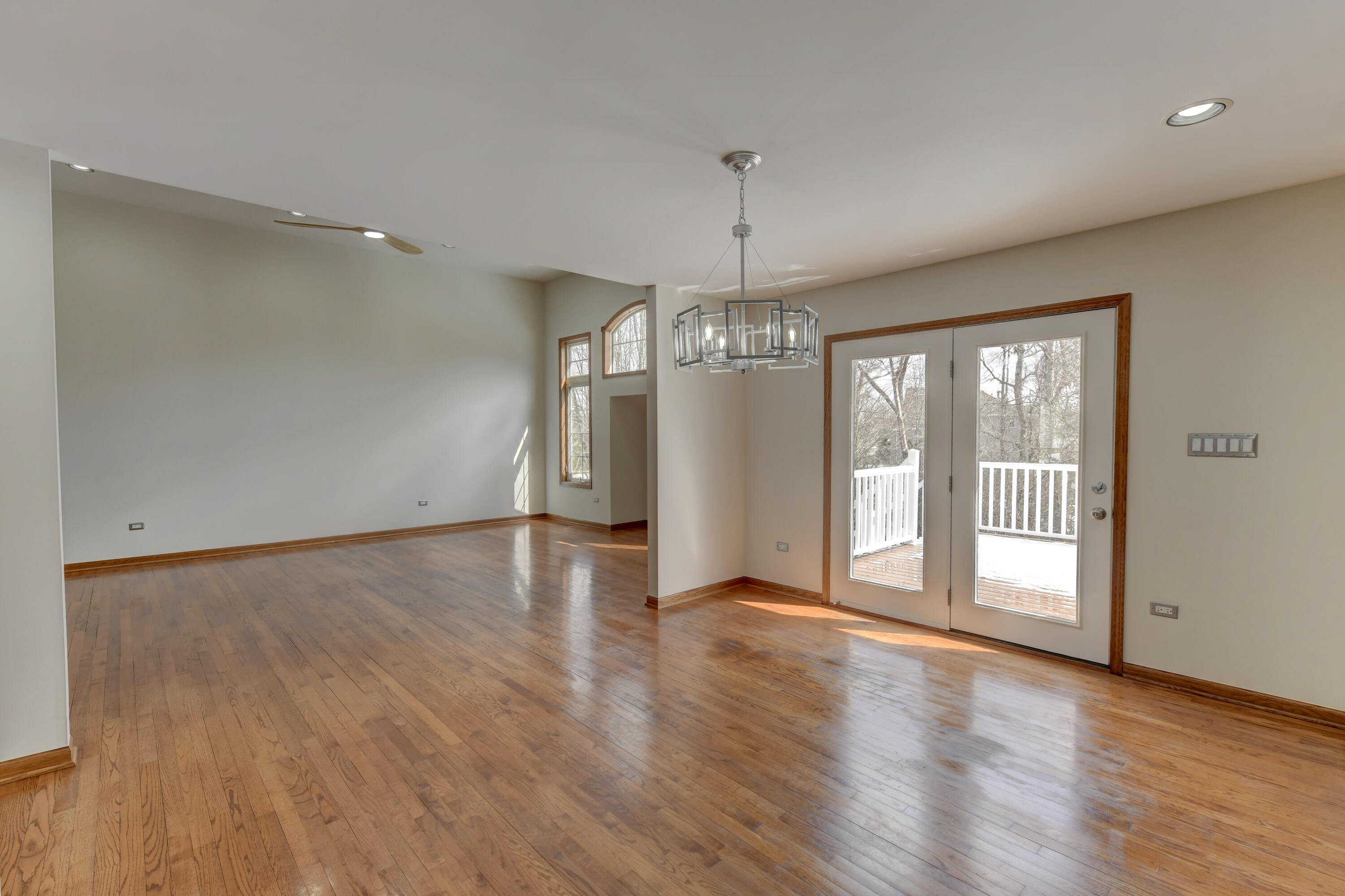 9575 Calumet Street Dyer, IN 46311 - Photo 29 of 53 a view of an empty room with a window and wooden floor