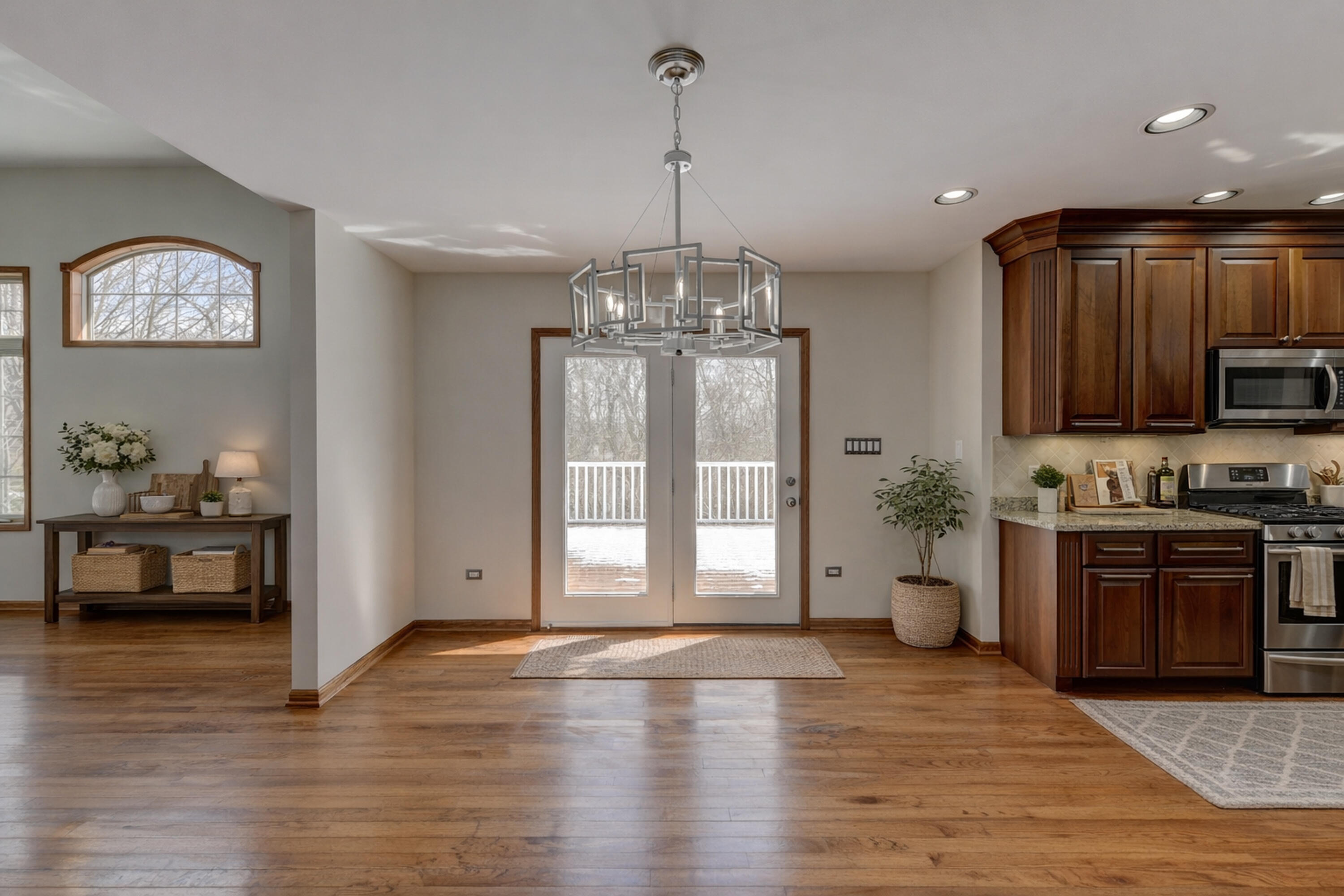 9575 Calumet Street Dyer, IN 46311 - Photo 31 of 53 a view of a kitchen with a sink dishwasher and fireplace with wooden floor