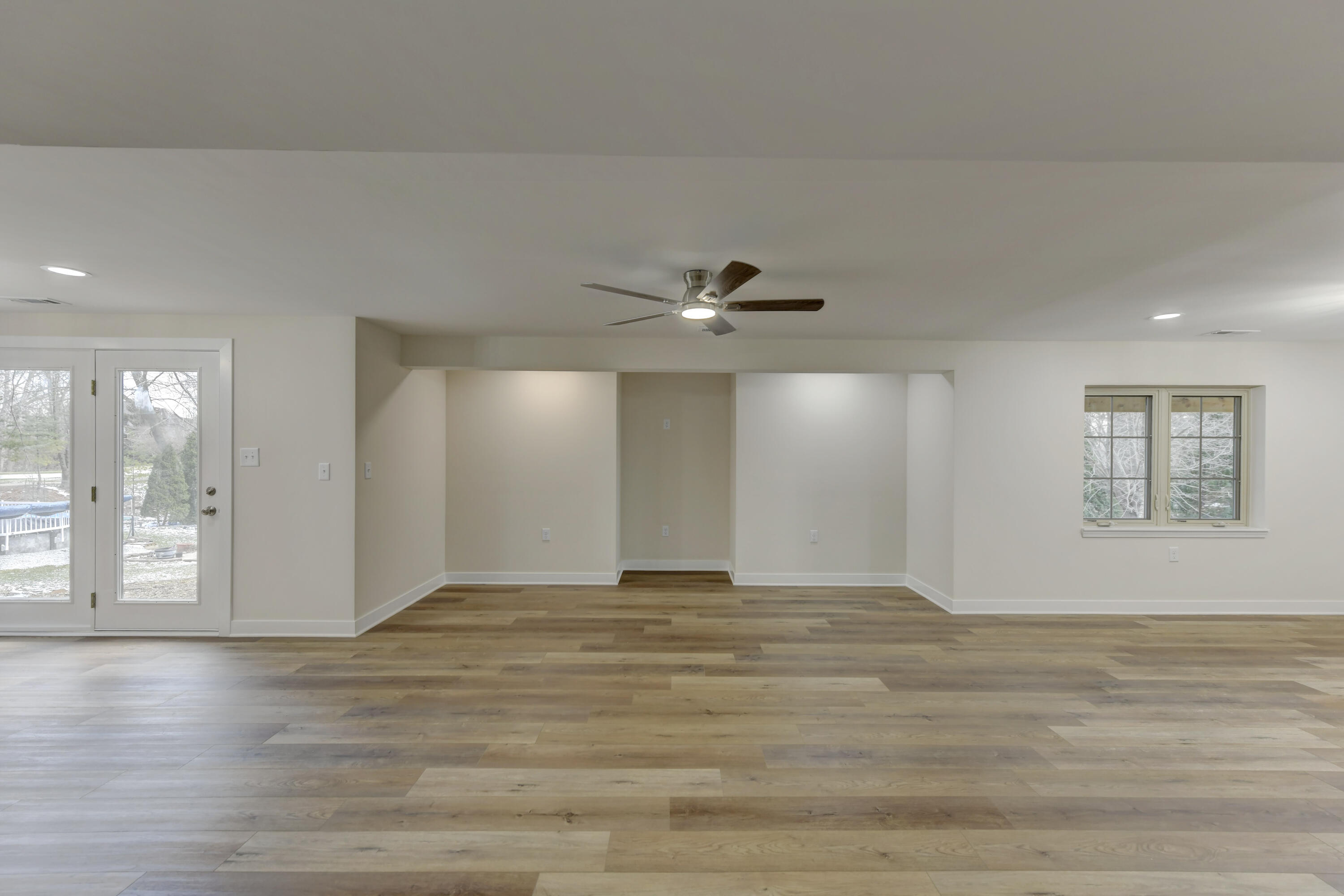 9575 Calumet Street Dyer, IN 46311 - Photo 44 of 53 a view of an empty room with window and wooden floor