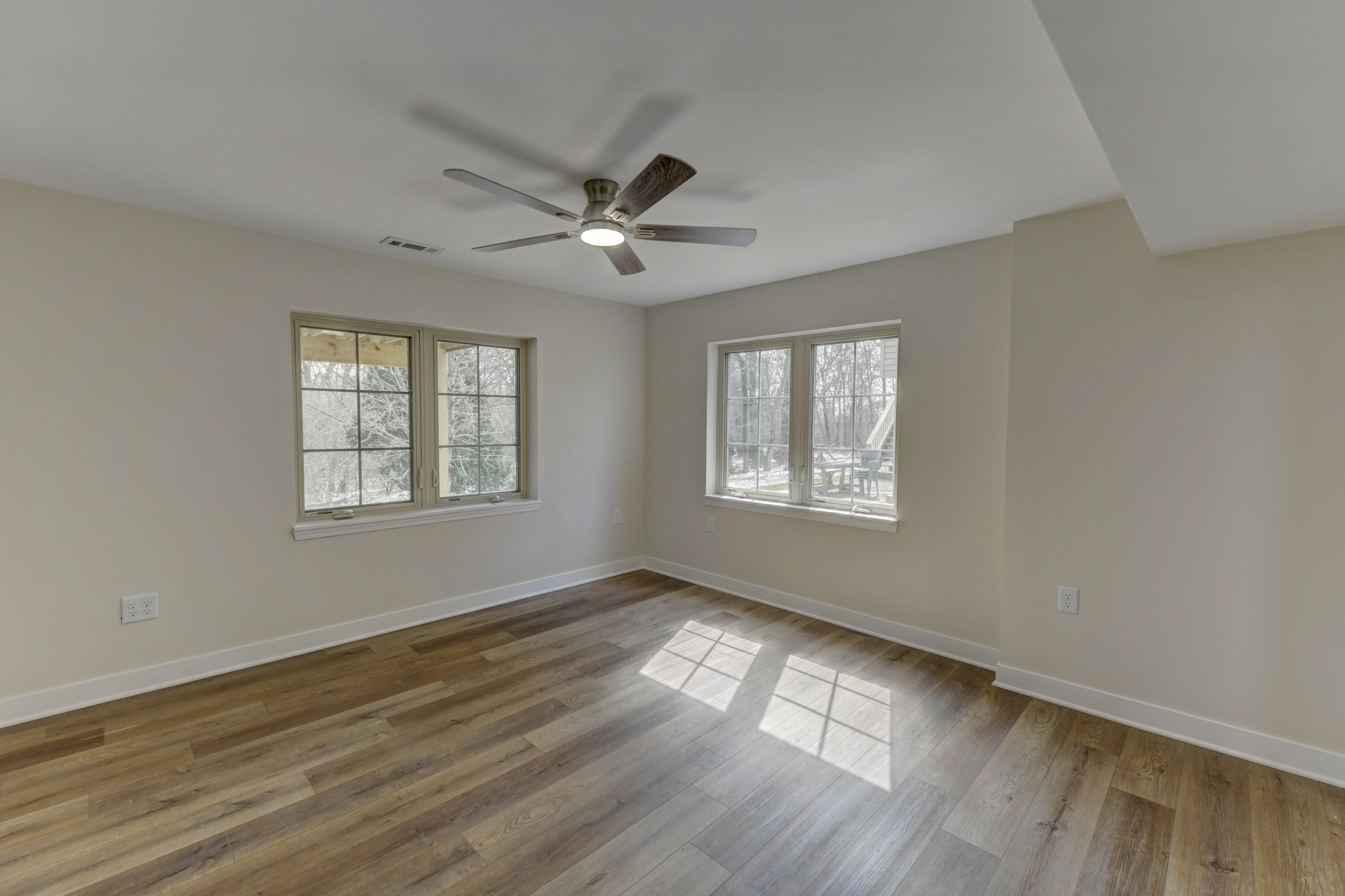 9575 Calumet Street Dyer, IN 46311 - Photo 48 of 53 a view of an empty room with wooden floor and a window