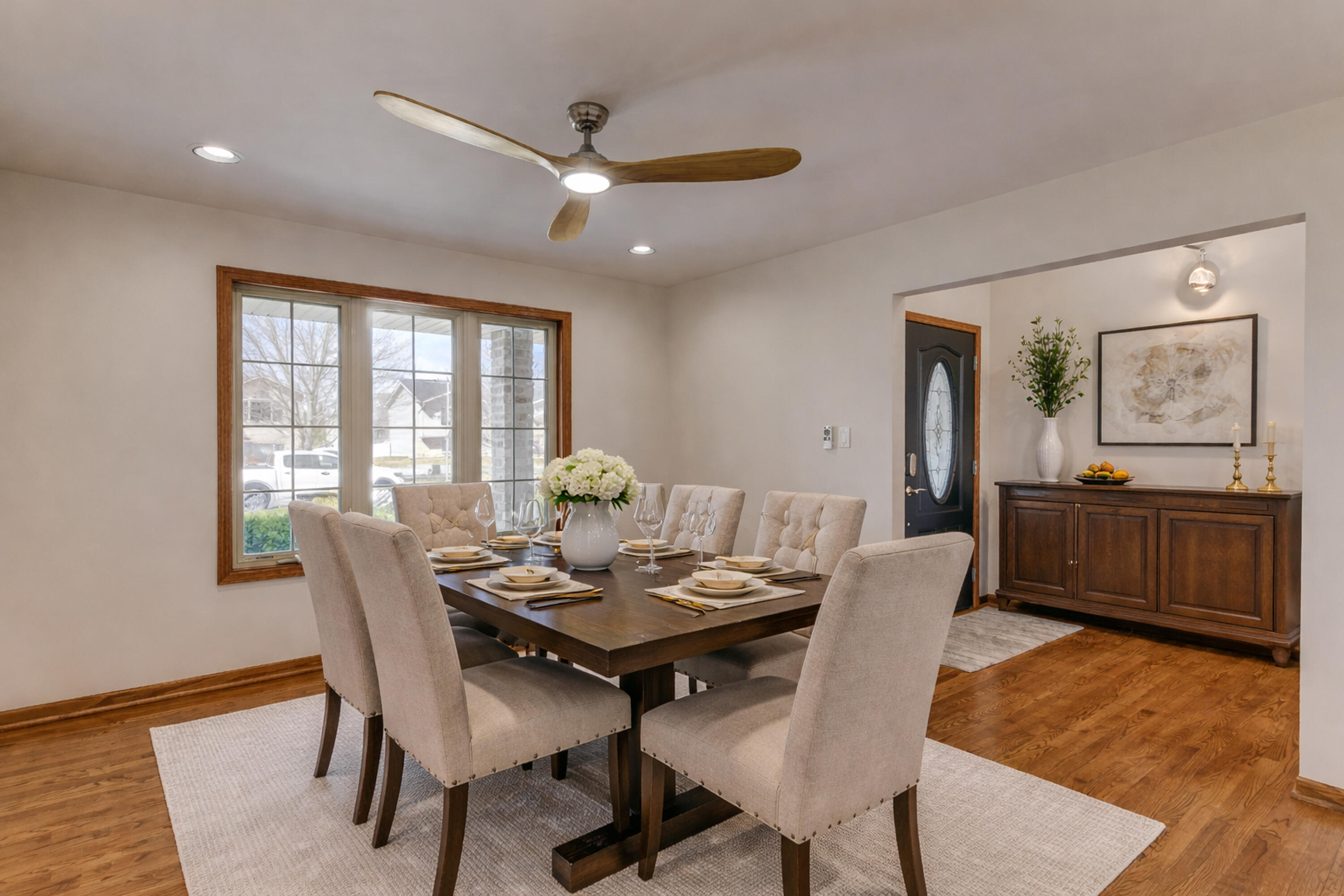9575 Calumet Street Dyer, IN 46311 - Photo 8 of 53 a view of a dining room with furniture window and wooden floor