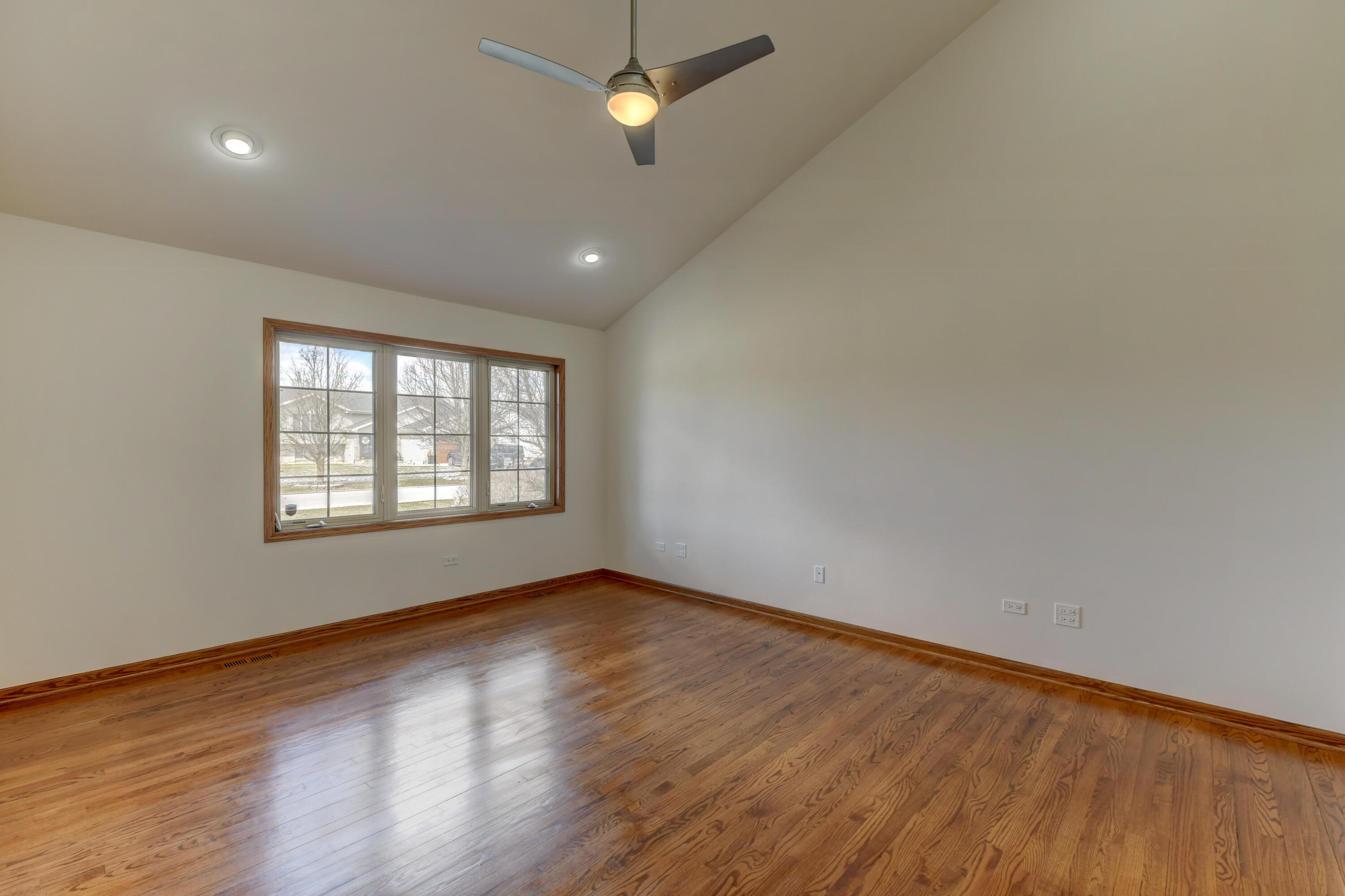 9575 Calumet Street Dyer, IN 46311 - Photo 10 of 53 wooden floor in an empty room with a window
