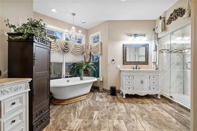 a living room with furniture and a mirror