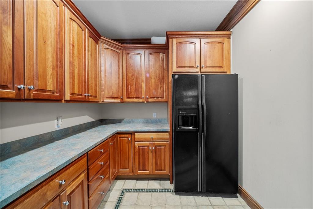 1351 Lindsey Road New Castle, PA 16105 - Photo 18 of 49 a kitchen with stainless steel appliances granite countertop a refrigerator and a sink