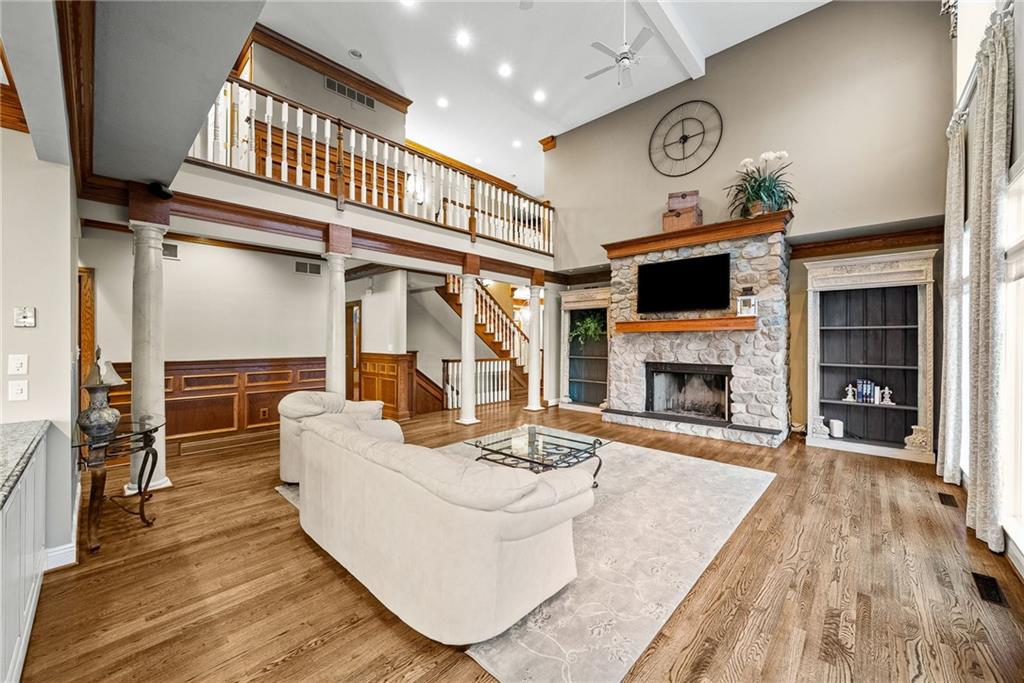 1351 Lindsey Road New Castle, PA 16105 - Photo 2 of 49 a living room with furniture a fireplace and a flat screen tv