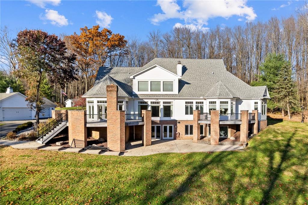 1351 Lindsey Road New Castle, PA 16105 - Photo 33 of 49 a view of a house with a big yard and large trees