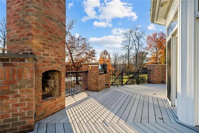 a view of outdoor space with deck and living room