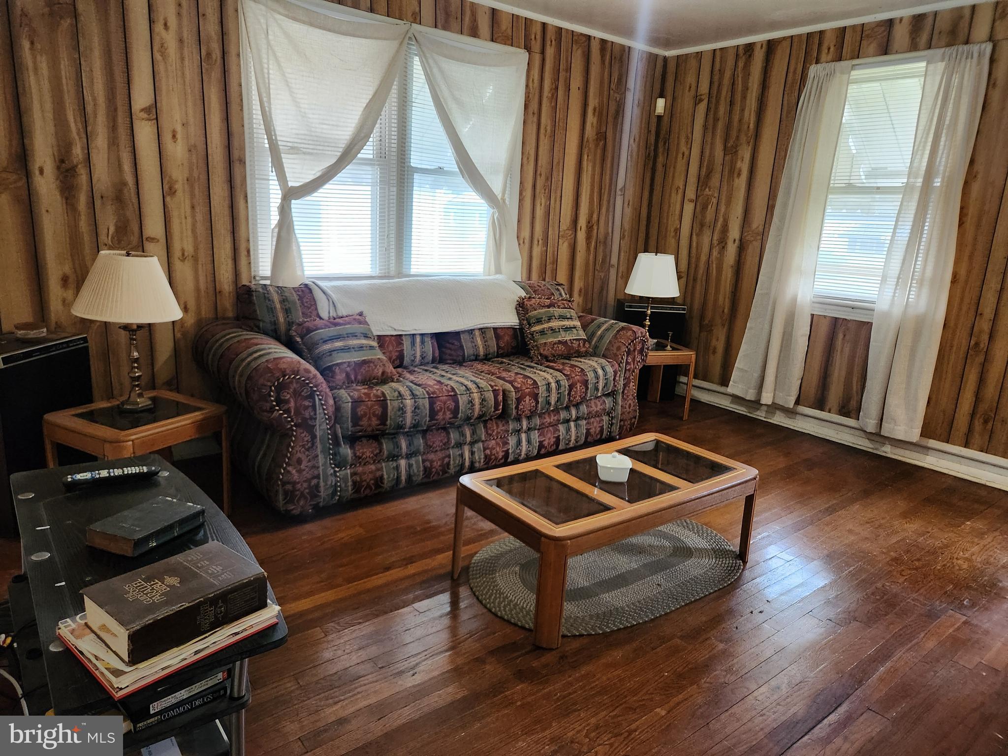 5023 Addison Road Capitol Heights, MD 20743 - Photo 2 of 17 a living room with furniture and a window