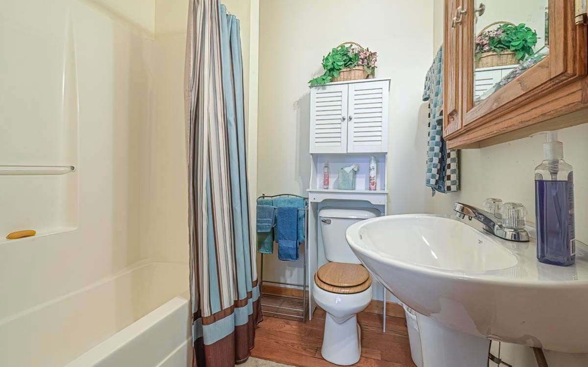 197 Macedonia Church Road Blue Ridge, GA 30513 - Photo 16 of 29 a bathroom with a sink toilet and shower