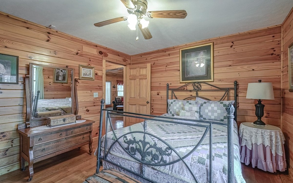 197 Macedonia Church Road Blue Ridge, GA 30513 - Photo 20 of 29 a bedroom with furniture and a large window