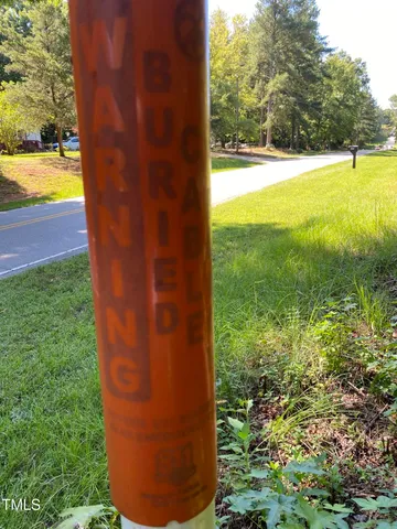 a close up of a lamp with a small space