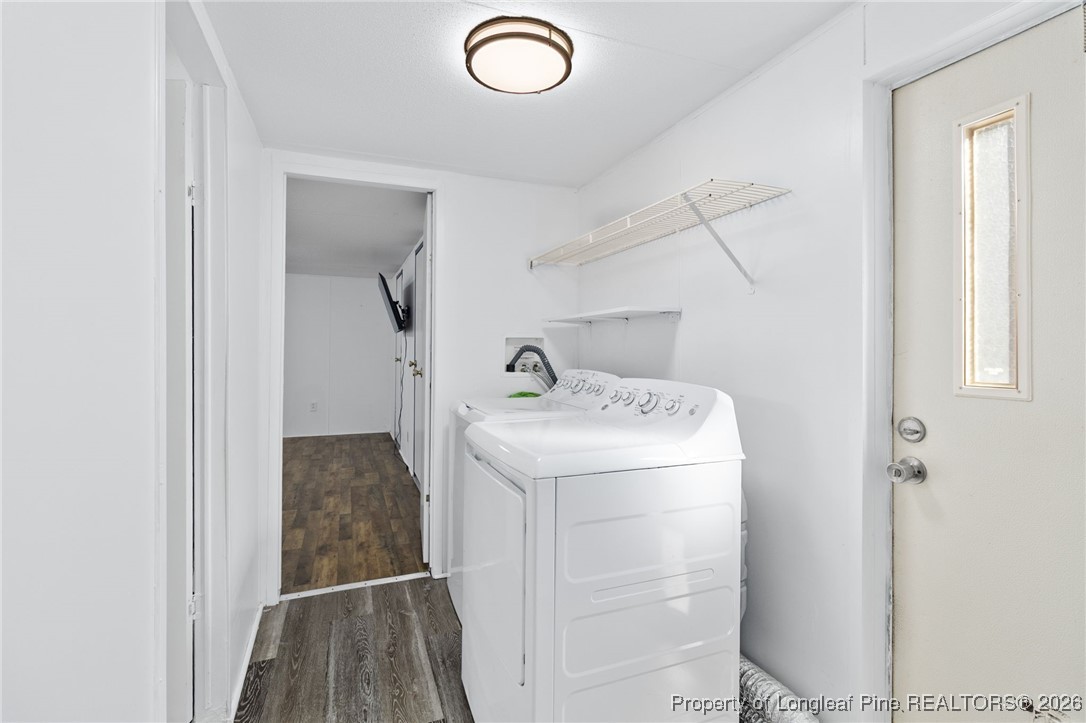 7321 Sheriff Watson Road Sanford, NC 27332 - Photo 13 of 26 a utility room with dryer and washer