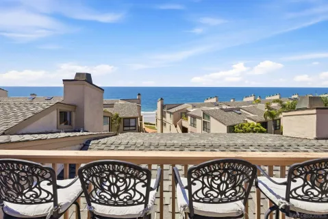 a view of a chairs and table on the terrace
