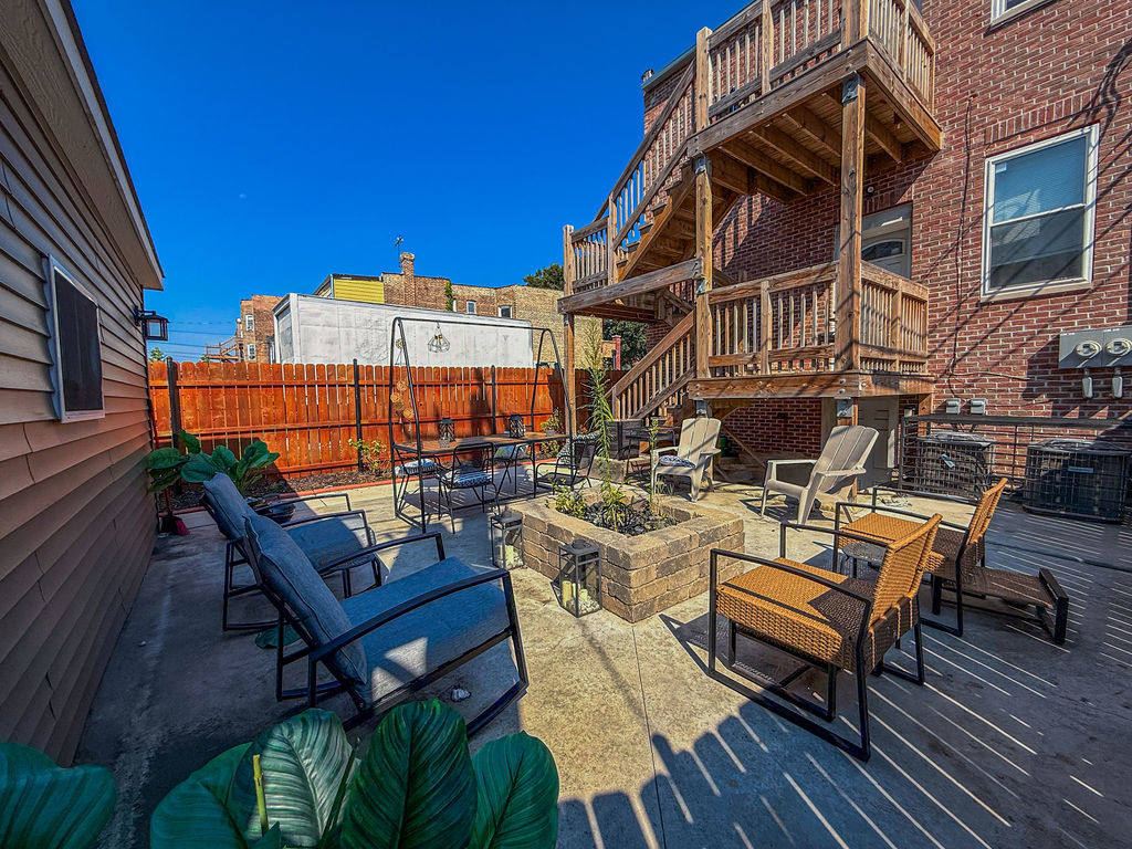 4817 West Jackson Boulevard, Unit 2 Chicago, IL 60644 - Photo 19 of 20 a view of a chairs and table in patio