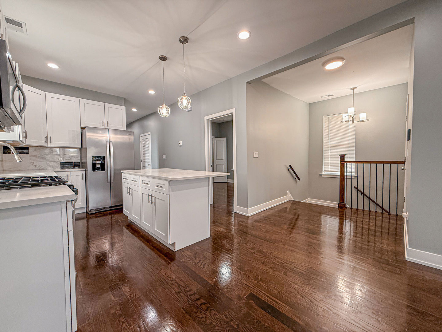 4817 West Jackson Boulevard, Unit 2 Chicago, IL 60644 - Photo 4 of 20 a kitchen with refrigerator and cabinets