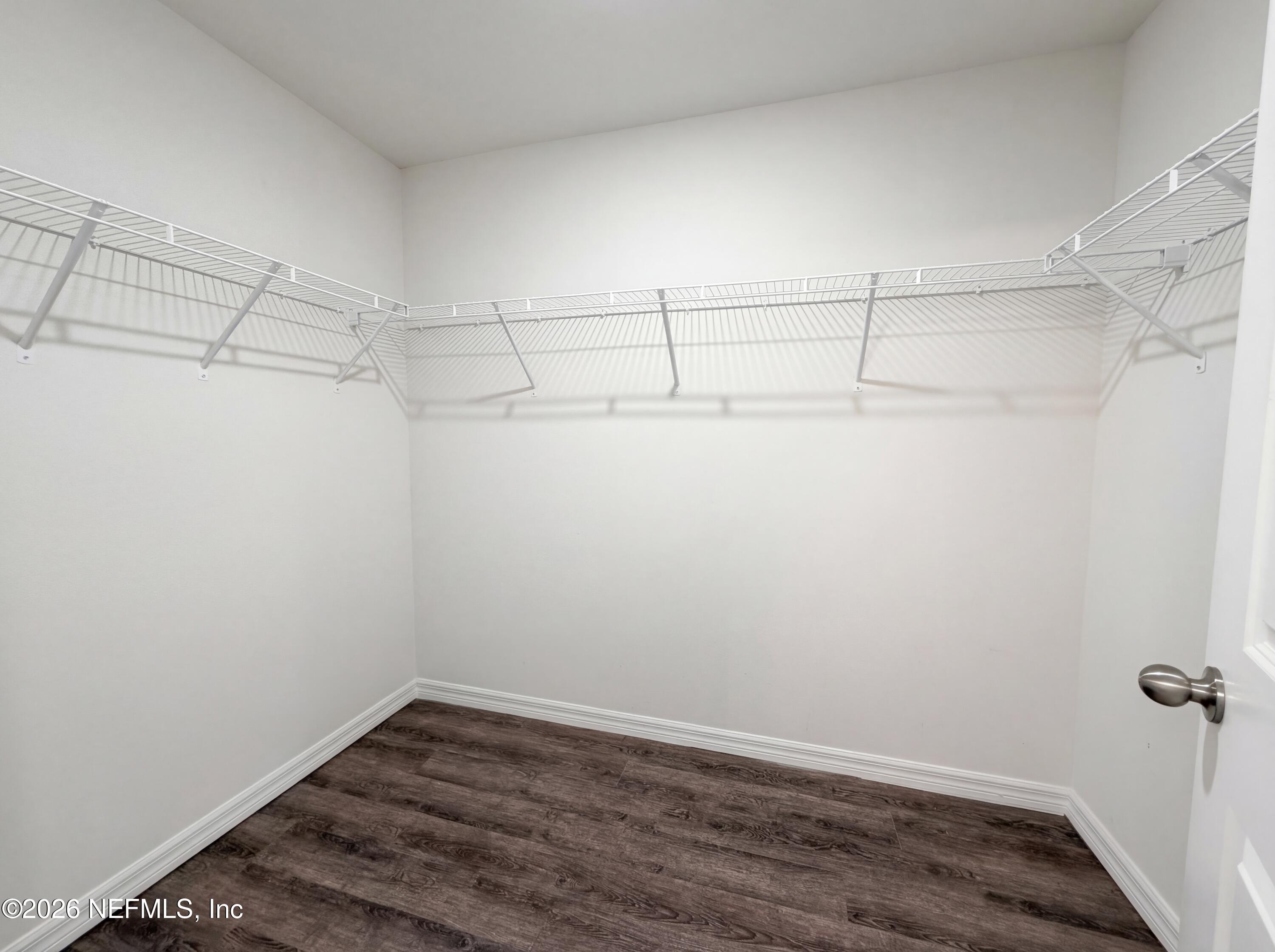 171 River Ridge Welaka, FL 32193 - Photo 15 of 17 a view of a room with racks on the wall