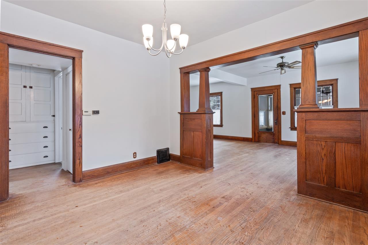 3202 Prairie Road Rockford, IL 61102 - Photo 5 of 21 a view of a livingroom with wooden floor and staircase