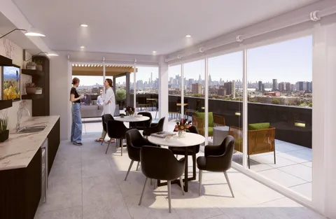 a view of a dining room with furniture window and outside view