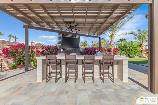 a view of an chairs and tables in the garden