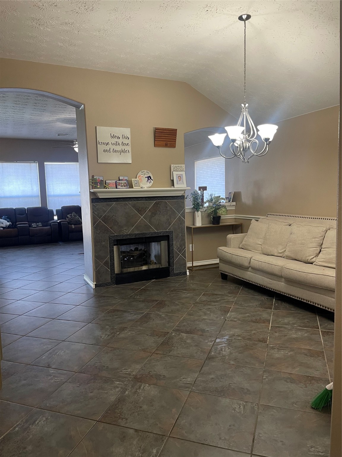 22911 Sebastian Drive Porter, TX 77365 - Photo 5 of 10 a living room with furniture and a fireplace
