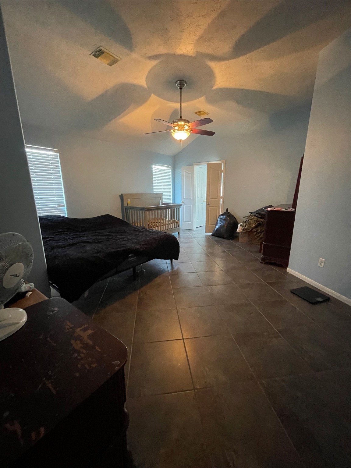 22911 Sebastian Drive Porter, TX 77365 - Photo 7 of 10 a living room with furniture and a chandelier