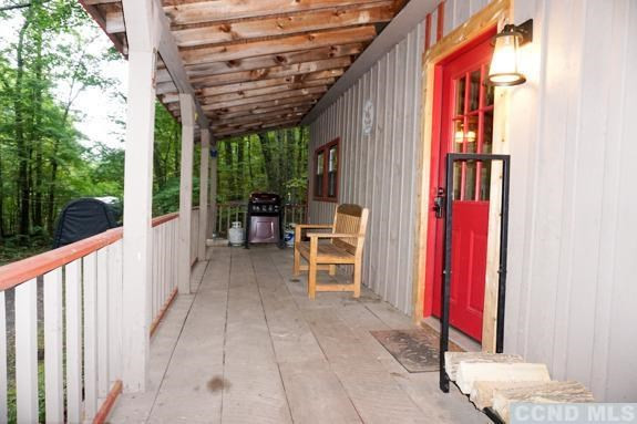 38 James Road Catskill, NY 12414 - Photo 2 of 10 a view of balcony with furniture and garden