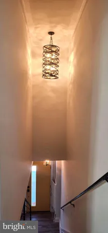 a view of water heater and wooden floor