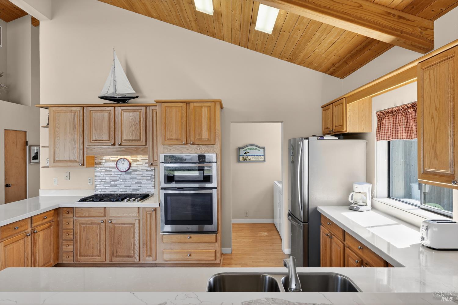 41339 Westwind The Sea Ranch, CA 95497 - Photo 20 of 60 Kitchen with adjacent pantry closet and washer/dryer