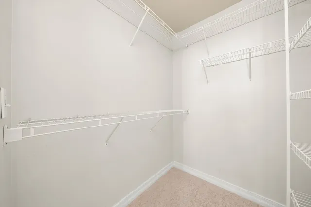 a view of a room with racks on the wall