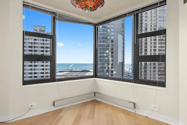 a view of an empty room with a window