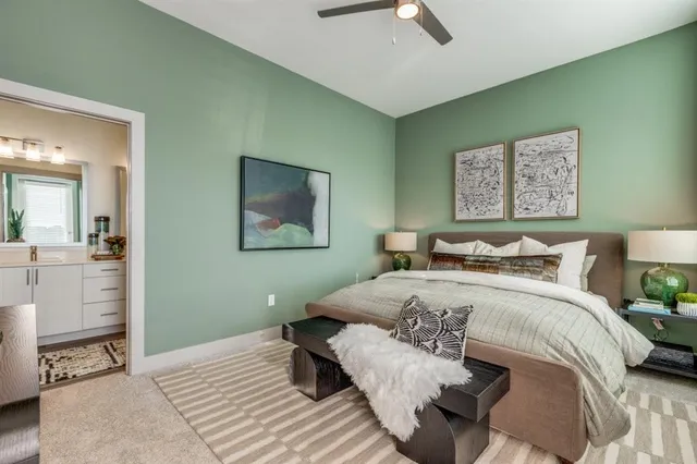 a bedroom with a bed and a couch