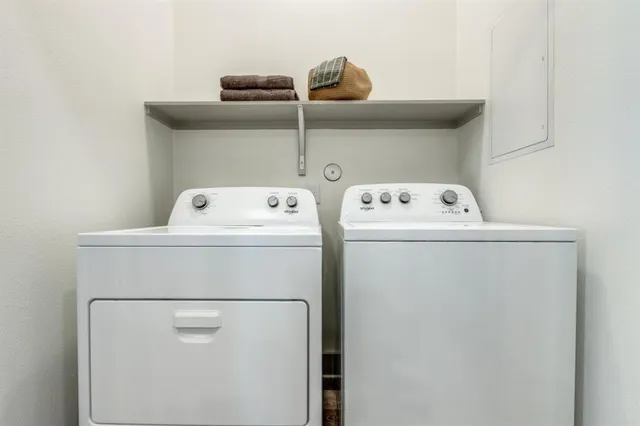 a utility room with dryer and washer