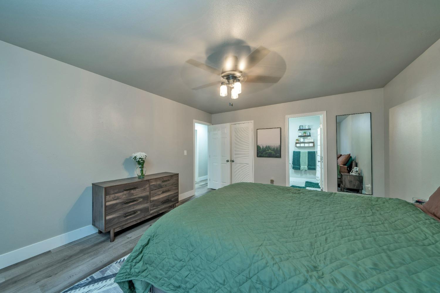 5781 Sly Park Road Pollock Pines, CA 95726 - Photo 11 of 40 a view of a room with gym equipment and a chandelier