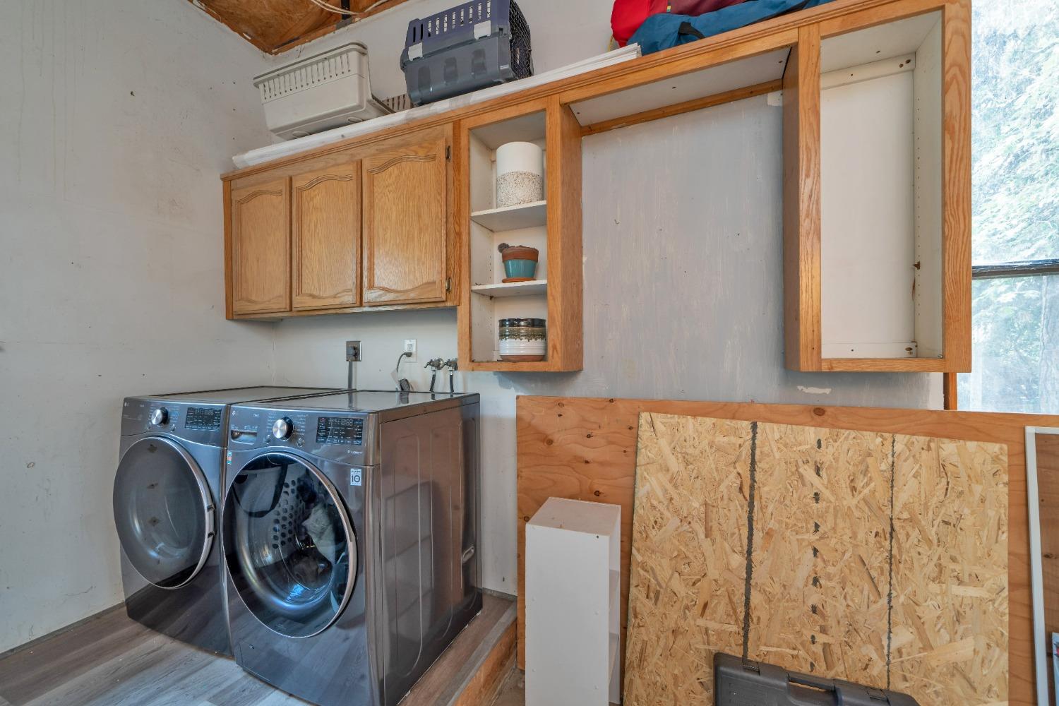 5781 Sly Park Road Pollock Pines, CA 95726 - Photo 24 of 40 a utility room with dryer and washer