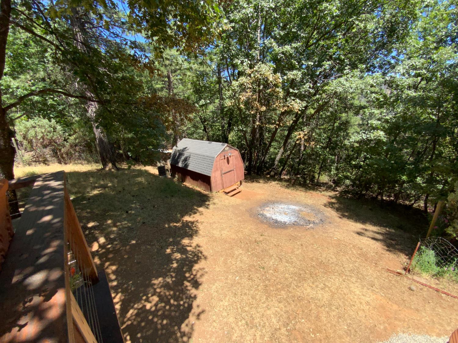 5781 Sly Park Road Pollock Pines, CA 95726 - Photo 31 of 40 a view of a yard with patio