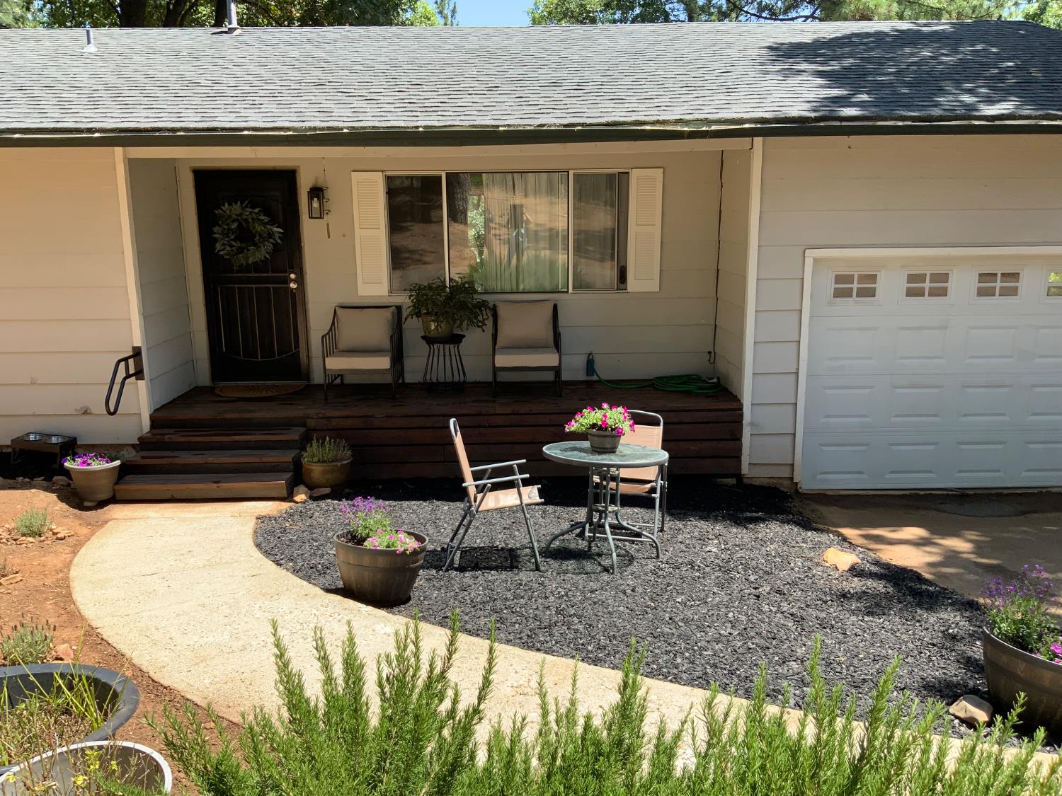5781 Sly Park Road Pollock Pines, CA 95726 - Photo 37 of 40 a view of a house with backyard and sitting area