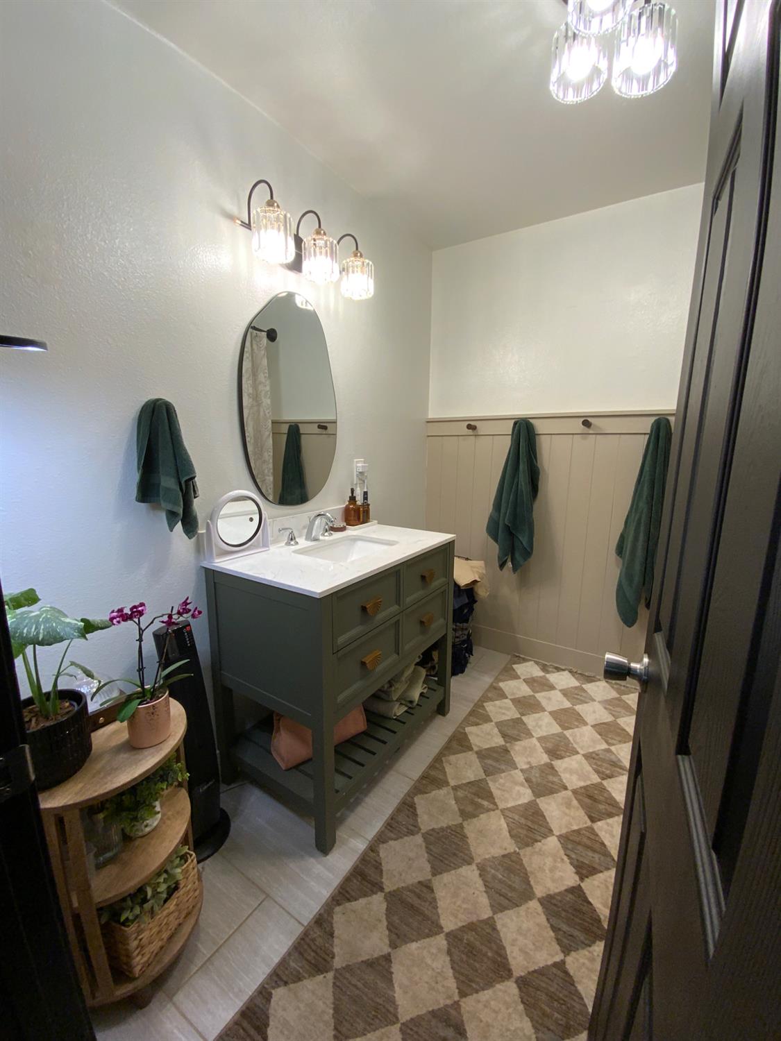 5781 Sly Park Road Pollock Pines, CA 95726 - Photo 4 of 40 a bathroom with a sink mirror and vanity