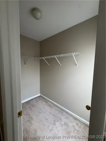 an empty room with a empty space and window