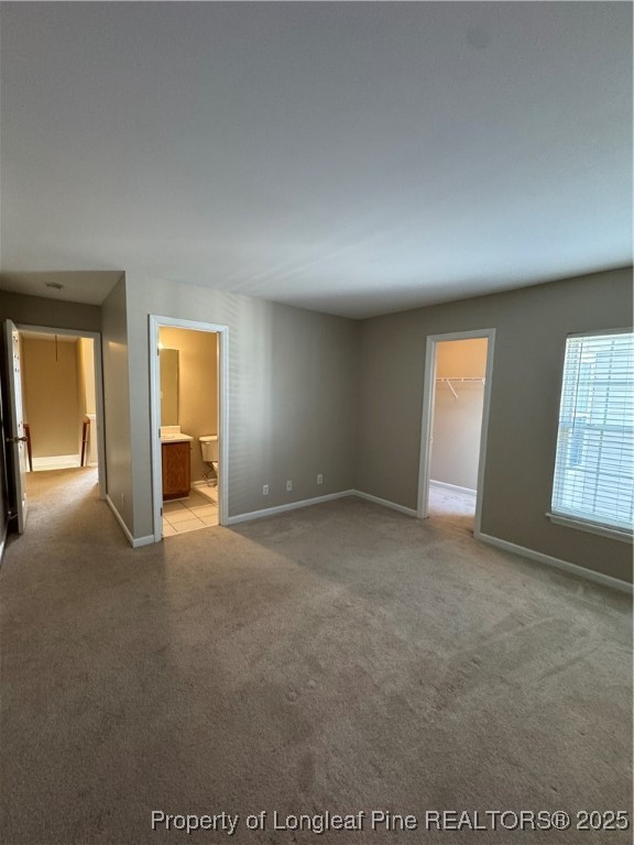 116 Higher Learning Drive Durham, NC 27713 - Photo 15 of 32 an empty room with windows and fireplace