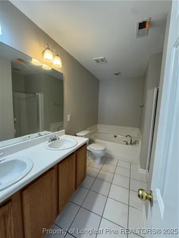 a view of a house with a potted plant