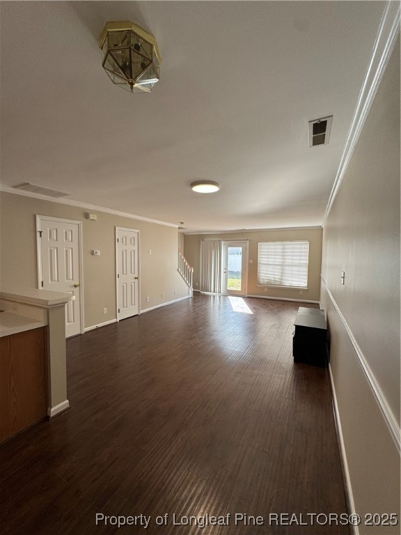 116 Higher Learning Drive Durham, NC 27713 - Photo 4 of 32 a view of an empty room with wooden floor and a window