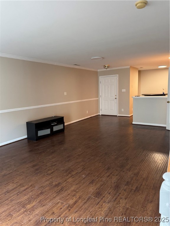 116 Higher Learning Drive Durham, NC 27713 - Photo 5 of 32 an empty room with wooden floor and cabinet